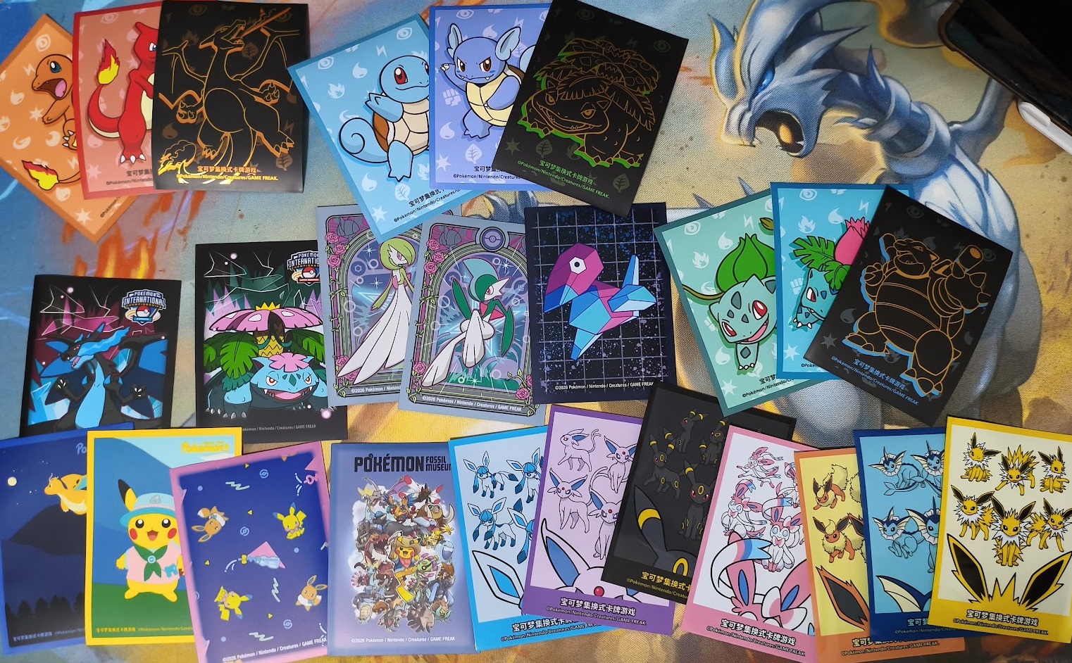 Acervo de Sleeves Oficiais Pokémon Center por Unidade